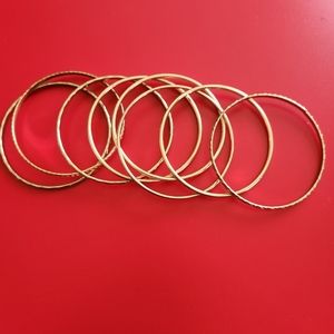 Designer Set of 9 Goldtone Bangle Bracelets